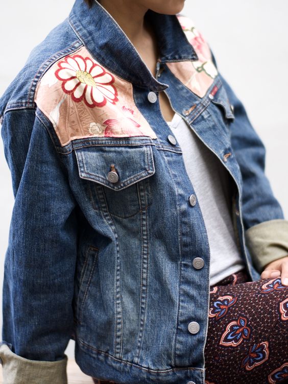 Denim jacket with coloured fabric shoulder patches