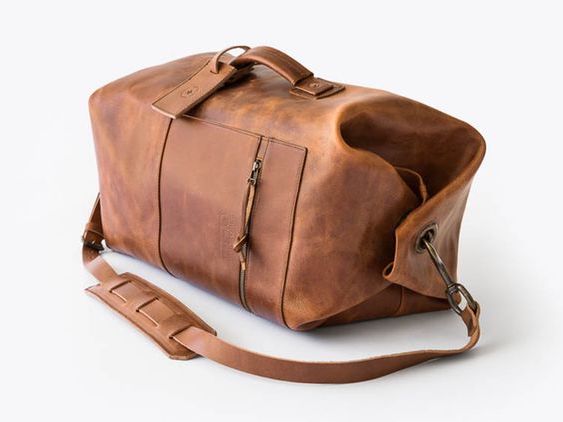 Leather sports or travel bag with zips