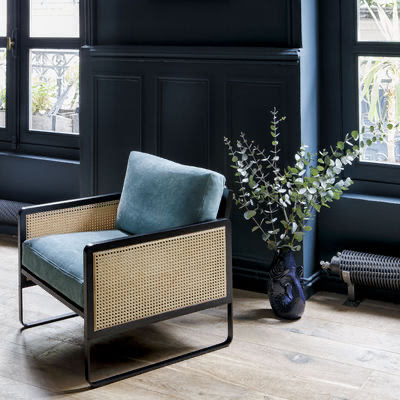 Blue velvet armchair