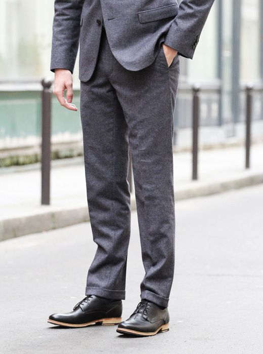 Dark grey men's suit with hem
