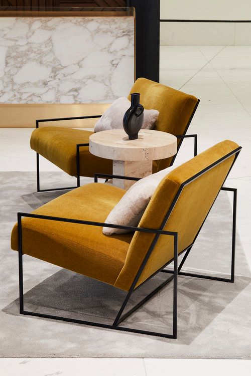 Light brown velvet armchairs