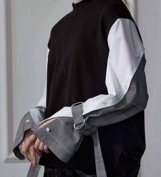 Sweatshirt with upcycled sleeves