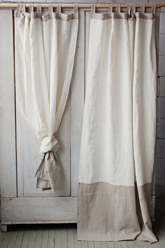 Curtains shortened by a bow at the bottom