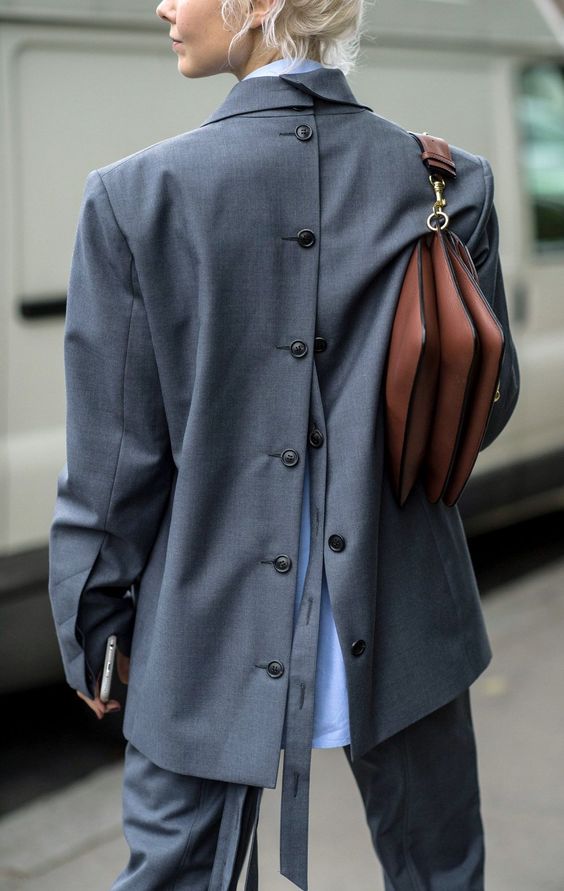 Suit with back buttonhole