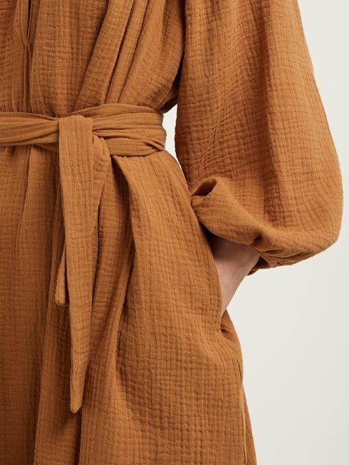 Dress fitted with fabric belt