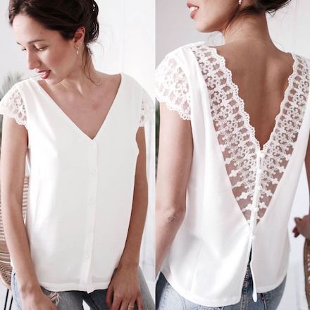 White top, front and back, lace sleeves and back