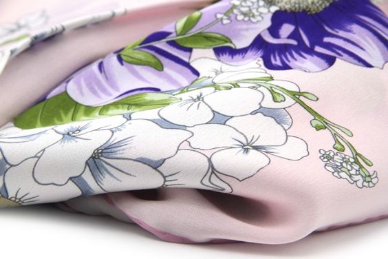 Pale pink scarf with white and purple flowers