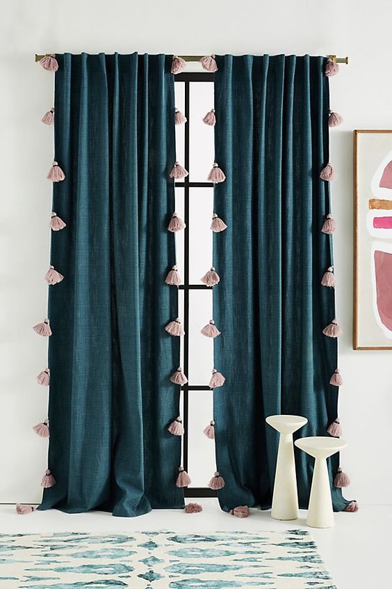 Long double curtains with pompoms