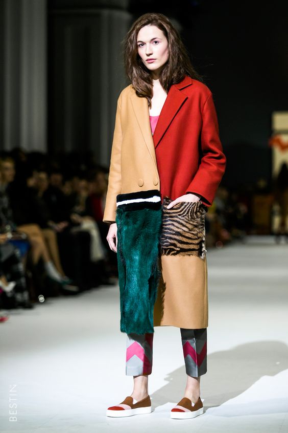 Long coat with material inserts in various colours