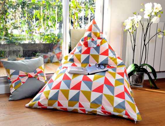 Pouf made from recycled curtain fabric