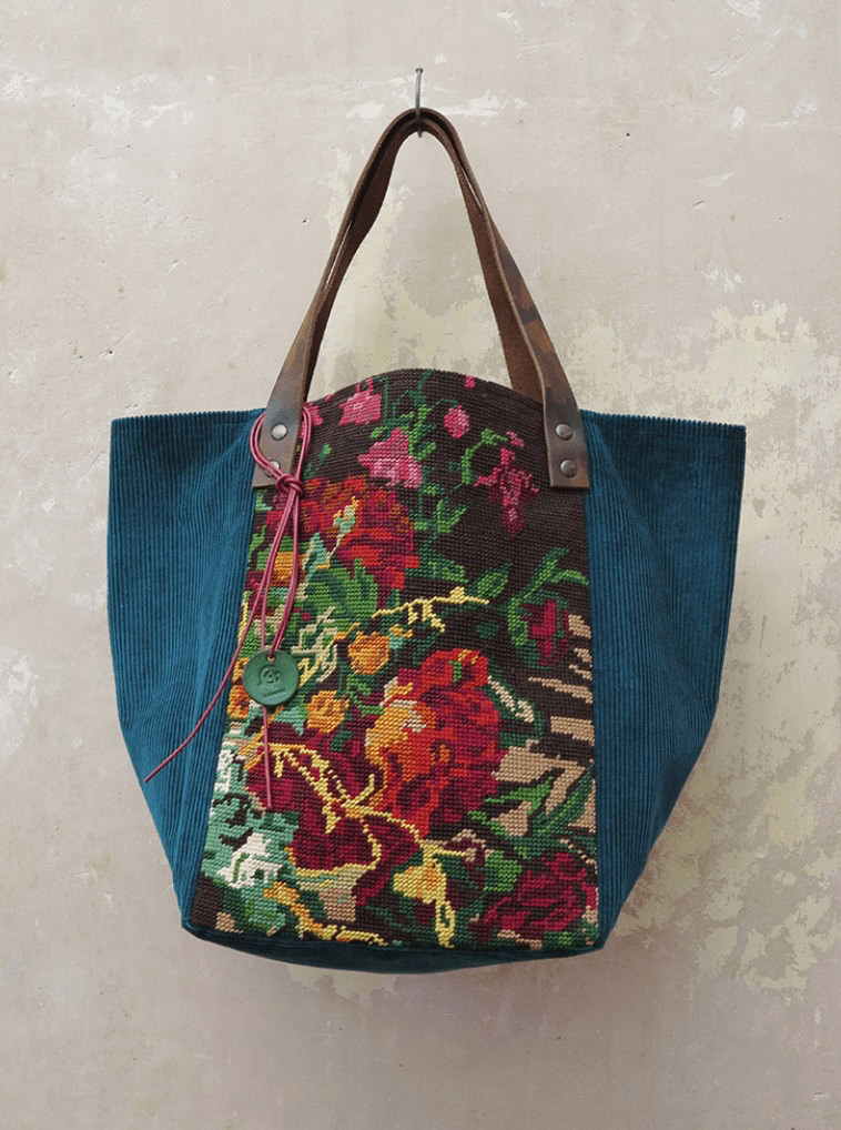 Denim tote bag with floral fabric yoke, bohemian spirit