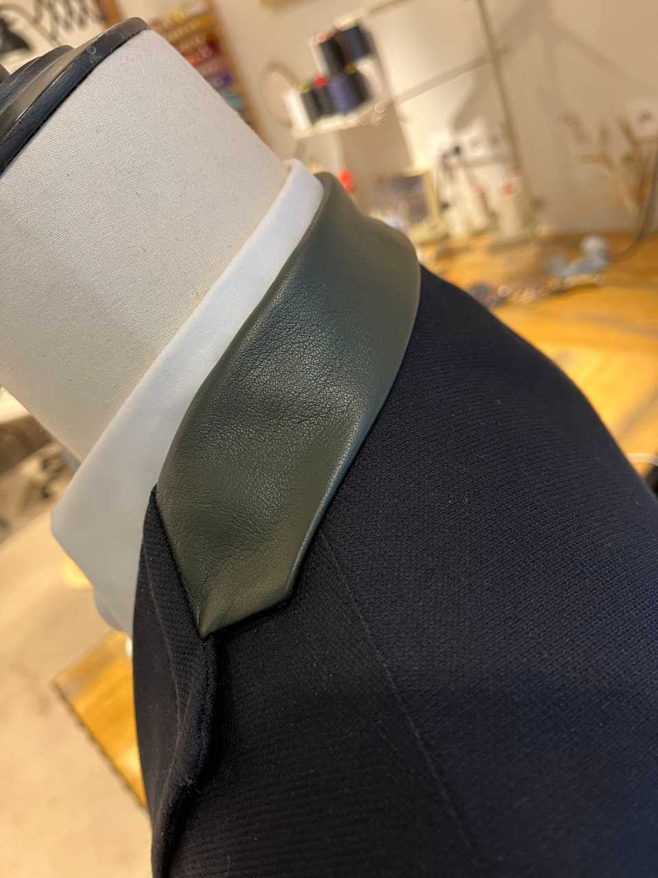 TILLI seamstresses repair and replace your damaged jacket collar.